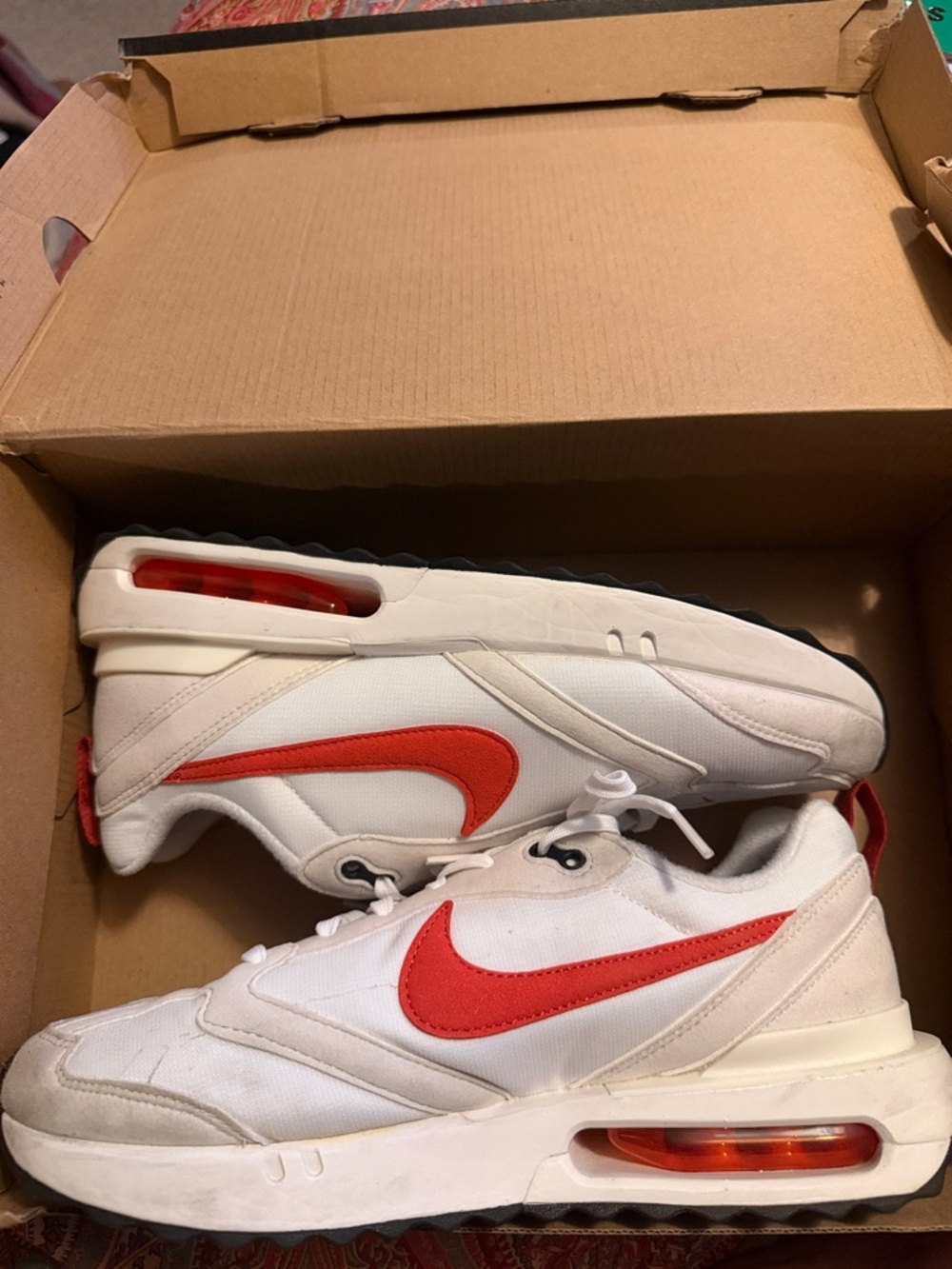Nike White Sneakers with Orange-Red Swoosh